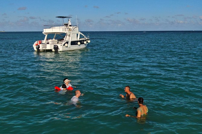 Cap Cana Private Family Catamaran - The water part: Juanillo Natural Pool, snorkeling gear, and sandbar time