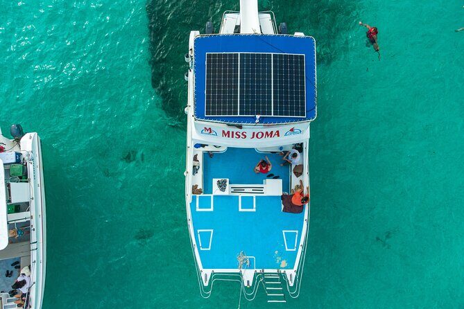Experience for families and friends by private boat with pick-up - The natural pool party 40 km off the coast: slides, music, and sea-level hangs