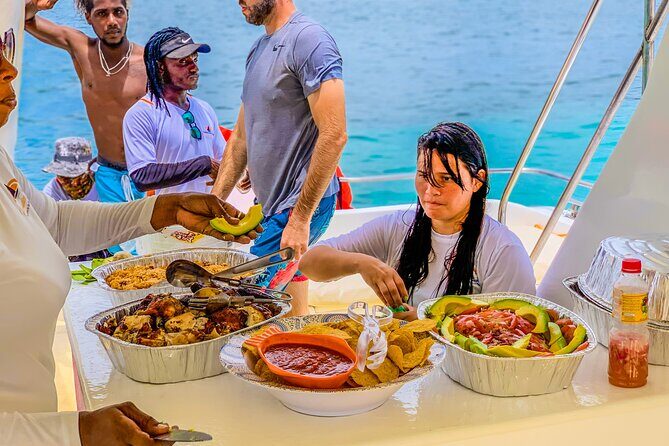 Float & Feast Private Party Cruise with Premium Buffet & Open Bar - On Board: Double-Deck Catamaran, Waterslide, and a Crew That Keeps It Moving