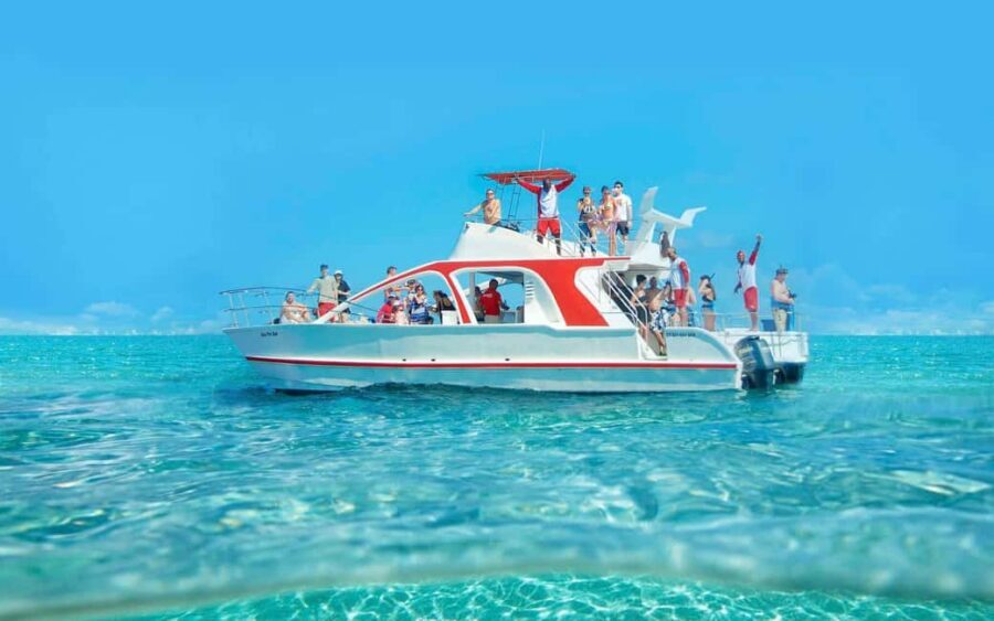 From Bavaro, Punta Cana: Boat Party, Snorkeling, Drinks, Snacks, and Transportation - Virgin Beach and the natural pool mega-party moment