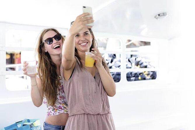 Happy Hour Party Boat With Snorkeling - From pickup to catamaran: how the timing really feels