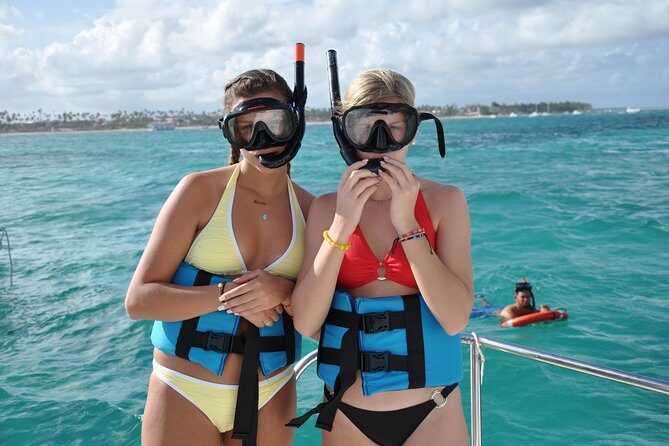 Parasailing, Snorkel Cruise & Virgen Beach from Punta Cana - Shark and stingray encounter: short, supervised, and often in a small area