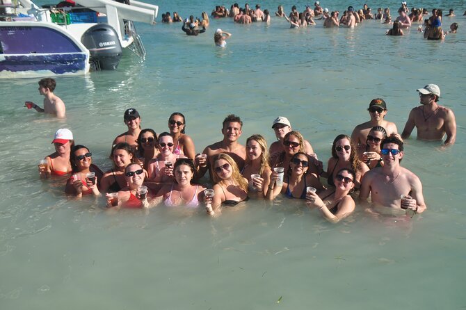 Private Catamaran Cruise with Slide & unlimited drinks - Boarding the Catamaran: Slide Time Starts Fast