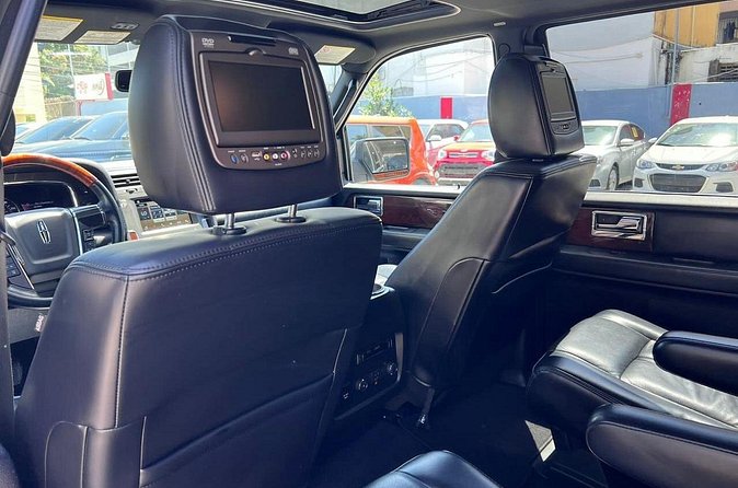 Punta Cana Airport Transfer: Luxuty Ride to Your Hotel - The hotel drop-off that actually helps: unloading your bags