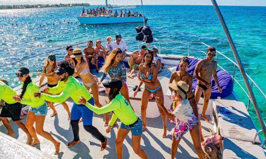 Punta Cana Area: Party Cruise with Parasailing and Open Bar - The 3-Hour Flow: Pickup, Open Bar, Parasail, Natural Pool, Back