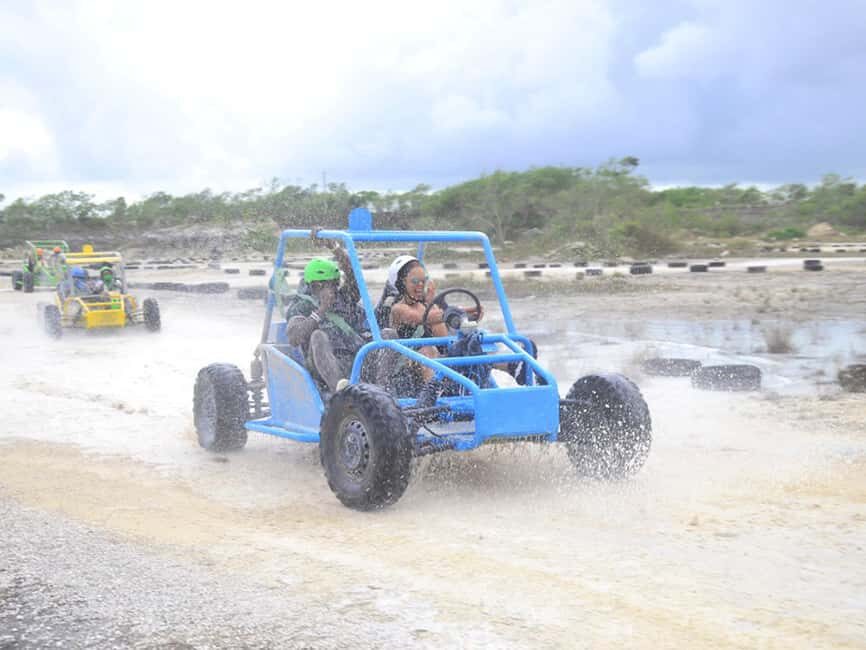 Punta Cana: Boogie Boarding and Parasailing Adventure - Muddy road-time: the boogie boarding style ride (and the quad bike slot)