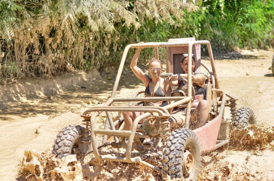 Punta Cana: Macao Beach Buggy Lagoon Cave Tour - Indigenous Springs cenote: short swim in turquoise underground water