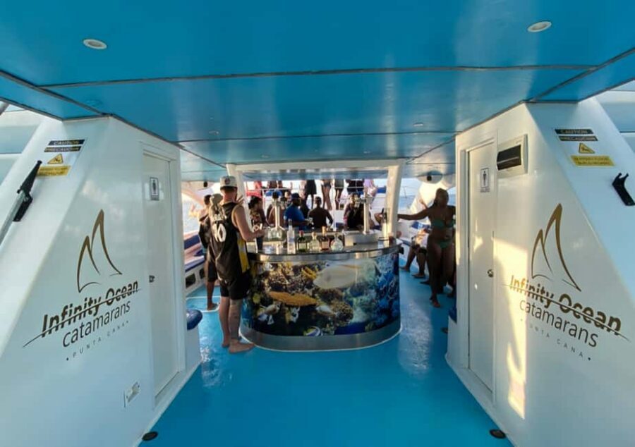 Punta Cana: Party Catamaran with Snorkeling & Private Beach - The Natural Pool Stop: Where the Day Gets Serene Again