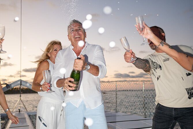 Punta Cana Sunset Catamaran Cruise with BBQ, Champagne & Music - Punta Cana Golden Hour From a Private Catamaran Ride