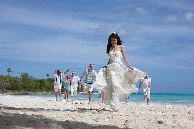 Punta Cana wedding photographer, Wedding ceremony - The ceremony look: pastel natural décor, rose petals, and a live orchestra