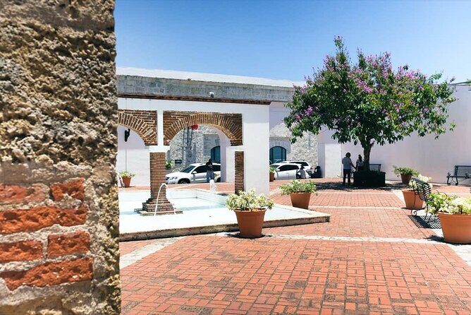 Santo Domingo Historical Tour with Caves from Punta Cana - Palacio Nacional and the photo-friendly garden pause