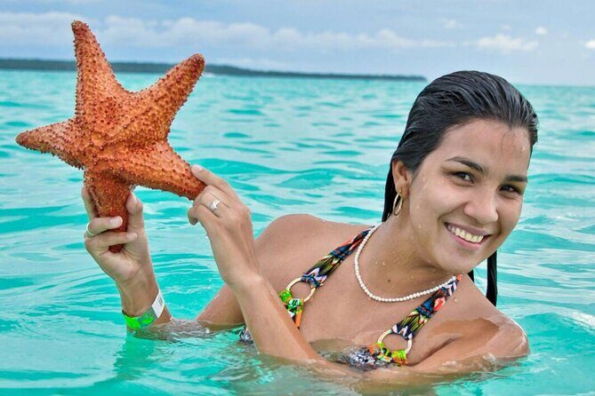 Saona Island from Punta Cana with Transportation and Lunch Included - Natural Pool Stop: Crystal Water, Starfish Photos, and a Drink Included