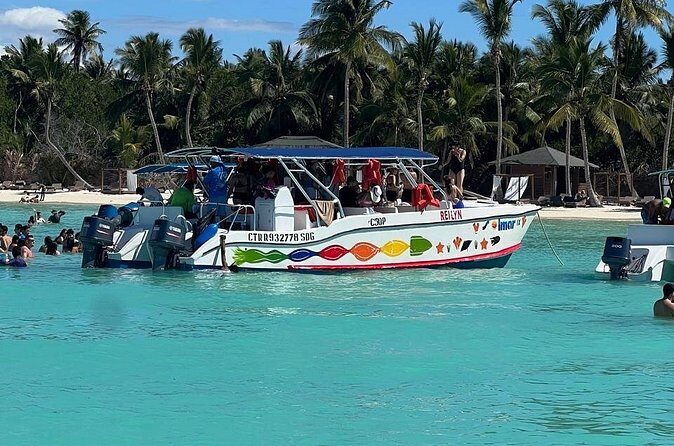 Tour to Saona Island with Lunch and Transportation - Playa Bayahibe beach hours: lunch included, turquoise water on deck