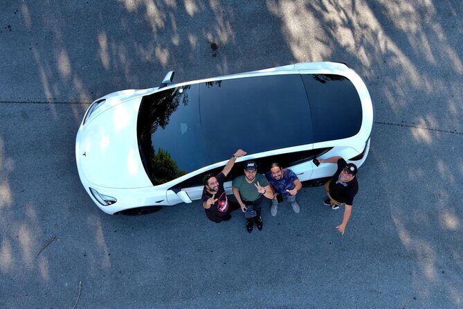 Transfer in Tesla from SDQ Airport to Santo Domingo - Door-to-door service across Santo Domingo (and back)
