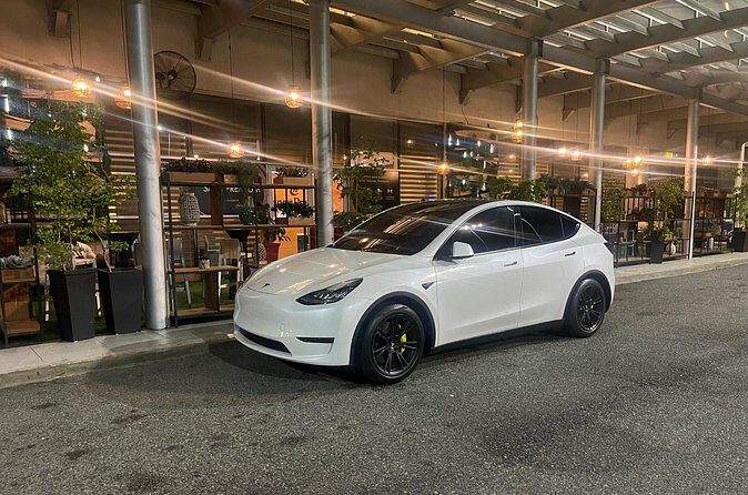Transfer in Tesla from SDQ Airport to Santo Domingo - Timing: about 50 minutes, but traffic is part of the deal
