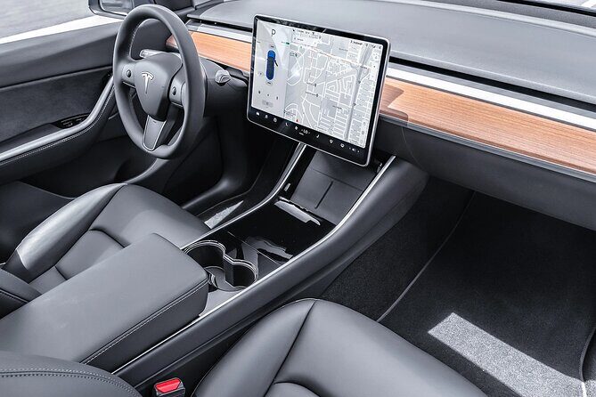 Transfer in Tesla from SDQ Airport to Santo Domingo - Finding the driver: pickup at SDQ or Las Americas without the stress