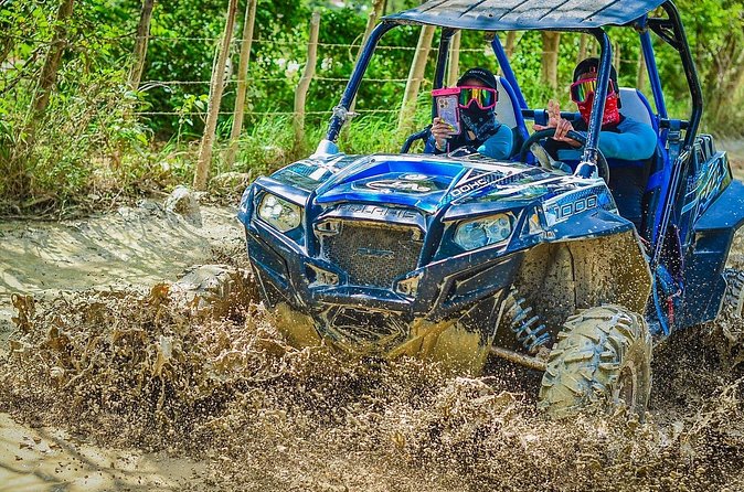Vip Punta cana Buggies - El Hoyo cave swim: cool underground water with a crowding tradeoff